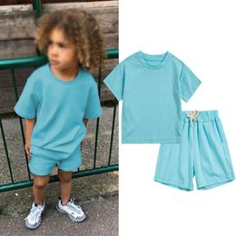 Kinderen Summer Sets Toddler Boy Girl Solid Sports T -shirts en shorts 2pcs Set Kids Casual Tracksuits Suits 06y 240410