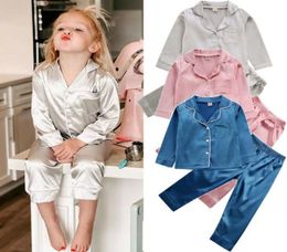 Childrens Kids Pyjamas Silk Satin Tops Pant Autumn Winter Lange Mouw Sleepwear Nightwear Girl Boy Pyjama Sets Q07202081592