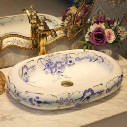 Lavabo en porcelaine fait à la main artistique de Chine comptoir de salle de bain rond en céramique lavabo de salle de bain ovale lavabo chinois Giuxb