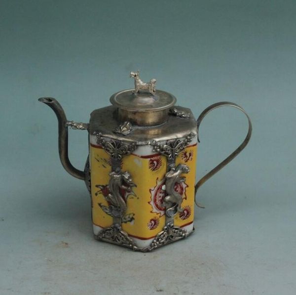 La Chine à la main en argent pot bouilloire paquet argent ornements en porcelaine jaune théière jaune théière