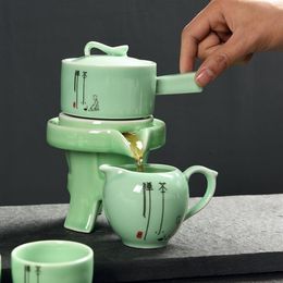 Juego de té chino Kung Fu, 6 tazas, taza de feria, tetera de agua giratoria, Tetera de cerámica, taza de té de estilo chino, regalo, juegos de té y café 2360