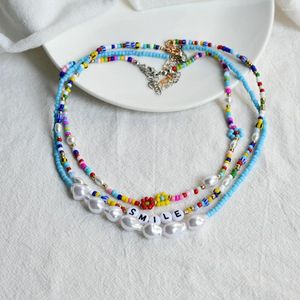 Gargantilla Bohemia coloridas flores cuentas de semillas gargantillas letras de sonrisa perlas colgante collares de clavícula mujeres regalo de cumpleaños joyería de fiesta