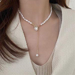 Collier ras du cou en perles d'eau douce, pendentif en forme de cœur, Long pompon, tempérament, chaîne de clavicule réglable, bijoux pour femmes