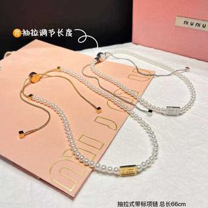 Le nouveau printemps 24 de la créatrice de Chokers Miss Miao tirant un collier de perles à la mode, luxe léger, diverses méthodes de port, grande chaîne de pulls 1ajz