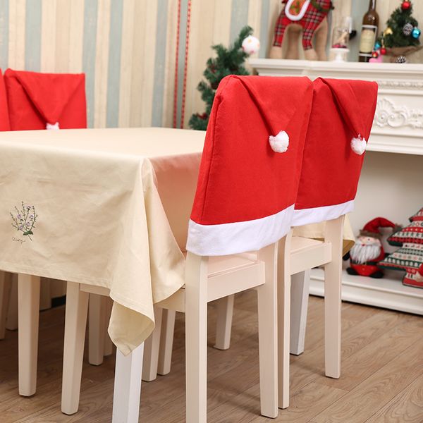 Cubierta de la silla de Navidad Papá Noel Sombrero rojo Cubiertas traseras Juegos de gorros para sillas de cena para decoraciones de fiesta en casa de Navidad nuevo 60 CM x 50