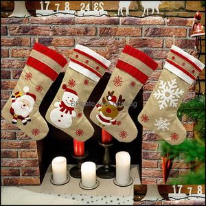 Kerstdecoraties 18,8 inch Big Christmas Kouunes jute canvas Santa Snowman Rendier Cuff Family Pack Gift Bags voor Xmas Holi DH1YM
