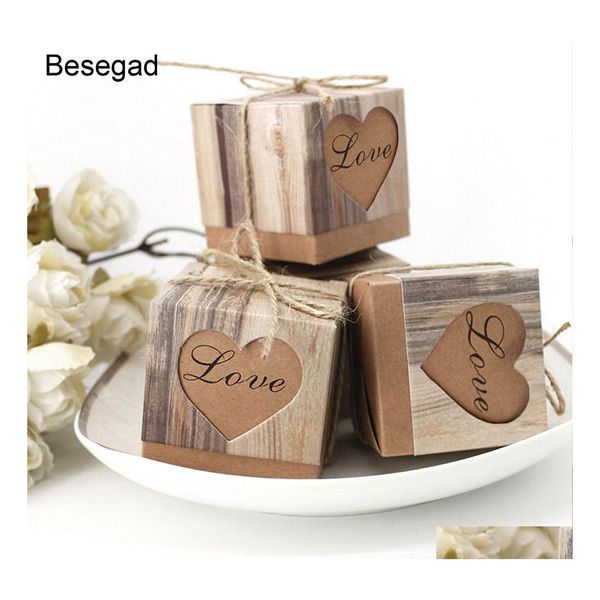 Décorations de Noël 50 pcs Kraft Papier Fête de mariage Candy Cadeau Boîte de faveur avec Kaki Burlap Twine Drop Livraison Home Garden Ot26U