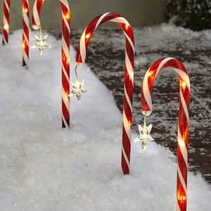 Décorations de Noël 8 pièces décorations de noël en plein air solaire canne à sucre lumières étanche LED jardin voie pelouse lumière noël année décor 231017