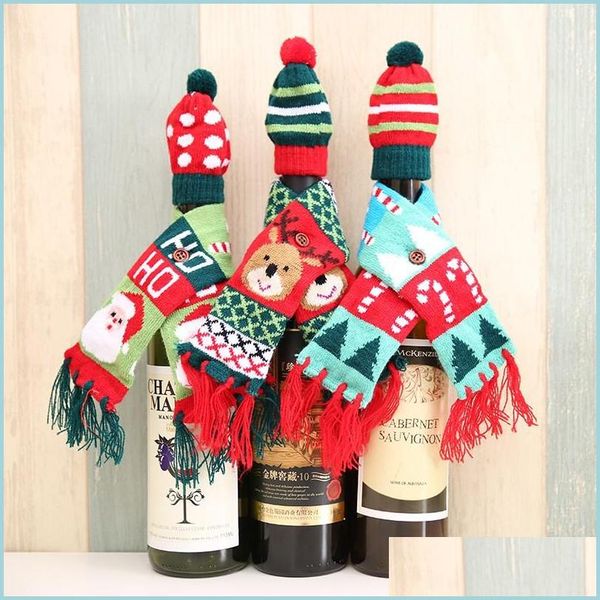 Decoraciones navideñas Mini Knit Santa Claus Reno Árbol Botella de vino Bufanda Sombrero Festivo Dot Stripe Mesa de comedor Decoración Drop Delivery Dhxpa