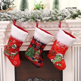 Decorazioni natalizie, calzini natalizi in peluche del Grinch, sacchetti regalo per bambini della vigilia di Natale, calzini di caramelle, sacchetti regalo