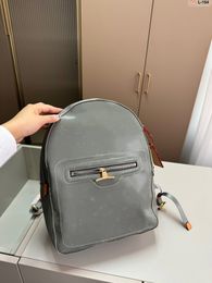 Moda Diseñador de lujo Mochila láser para hombres Lona recubierta de titanio Bolsa de senderismo al aire libre Bolsa de viaje Bolsa de hombro reflectante Bolsa cruzada Bolsa de mensajero Bolsa de taleguillas