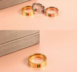 Klassiek 6 mm Green Red G Ring 316L Roestvrij staal Gold Silver Rose Dames Men Men Trouwliefhebbers Anillos Mode Branded Sieraden Groothandel