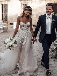 Klassieke Boho Tule A-lijn trouwjurken Long Beach Bridal Troogs Mouwloze lieverd nek kanten appliqued blootgestelde uitrusting corset bruid vestido de novia