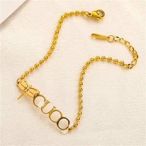 Klassieke armbanden dames bangle ontwerper hollow out letter armband kralen ketting goud vergulde roestvrijstalen geschenken polsband manchet