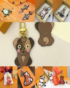 Dessin animé mignon Tiger Keetchain portefeuille clés de concepteur Animal Car Penguin Letter Fox Kelechains Femme Charme Pendant Accessoire6435314