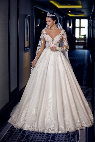 Klassische Kapelle Brautkleider Langarm Spitze Brautkleider Perlen Hofzug Plus Size Sexy Rückenfreies A-Linie Brautkleid Vestidos De Novia