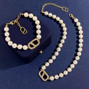 Classic Cultivated Women's Pearl and Diamond V-Letter Pendant Bracelet Earring Jewelry Set for Wedding and Birthday Parties