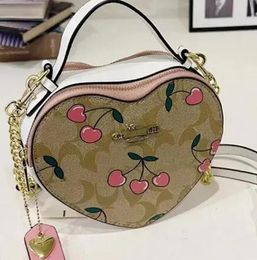 Bolsos de mensajero a rayas con movimiento de corazón lindo clásico nuevo bolso de mujer con caja de amor para presbicia