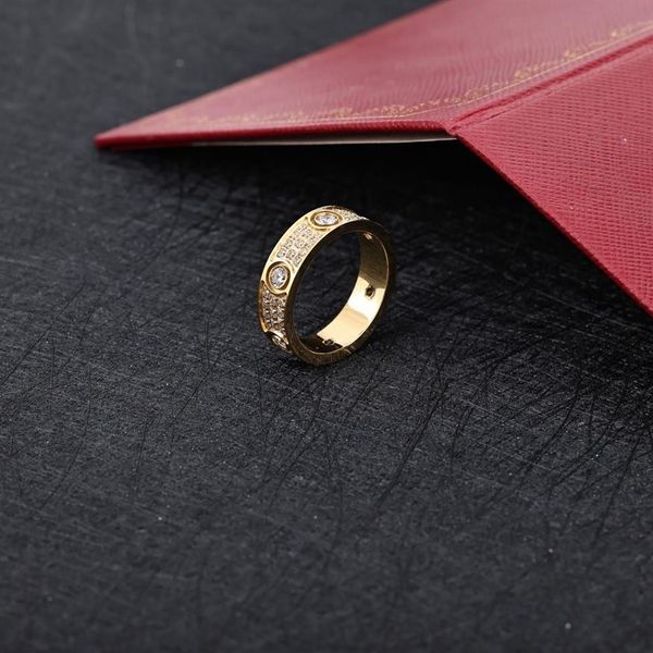 Anillos de amor de diseño clásico para mujeres y hombres, anillos de boda de acero de titanio 316L, joyería de circonia cúbica completa Paved261Q