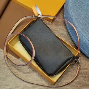 AaaHigh Quality 51980 avec boîte de luxe Brand de créateur de luxe Polie en cuir marron classique Unisexe Accessoire de voyage mini accessoires Pochette