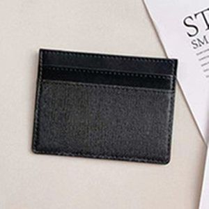 Classic Designer G Porte-cartes Portefeuilles pour hommes Porte-monnaie pour femmes Texture d'impression en cuir noir Cartes de crédit double face Mini portefeuille avec boîte en gros 102701