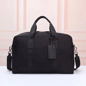 Sac à bagages de mode masculine de créateur classique Black Toile imperméable Sac de voyage pour hommes Sac de transport SCRRIE D'AFFAIRES MENS