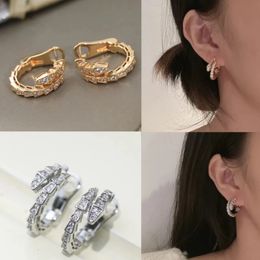 Boucles d'oreilles de serpent européen et américain classiques 925 Tempérament de luxe en argent Gift de marque de mode pour femmes 240516