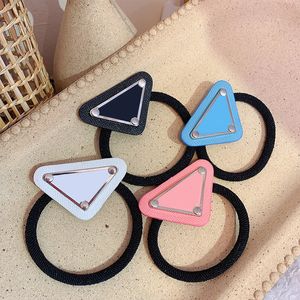 Diseñador de moda clásico para mujer Bandas de goma para el cabello Pelos Scrunchy Clips de anillo Elástico Triángulo Diseñadores Deportes Hairband Pony Tails Holder regalo