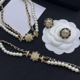 Moda classica Xiaoxiang C Catena di perle Collana a doppio strato Xiangnanzhu Doppio braccialetto intrecciato nero Orecchie placcate Gioielli di lusso