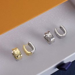 Klassieke zeer herkenbare designer oorbellen, goud met zilver, 2 kleuren, stijlvolle damesoorbellen