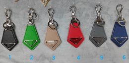 Porte-clés classique avec Logo Triangle inversé, lettre en métal, pendentif de personnalité, sens avancé, sacs de décoration