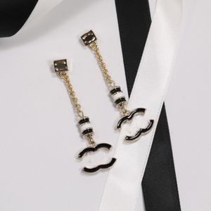 Classic Luxury Brand Stud -oorbellen zwart -witte emailcilinder Dubbele letter Pendant ketting Fringe Never Fade Brass Jewelry cadeau
