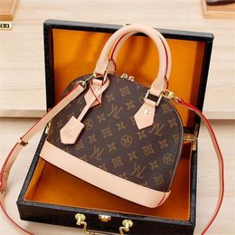 Bolso de diseñador de lujo clásico Alma BB Shell Bag Bolso de mujer Etiquetas Small Lock Bolso de embrague de cuero Lujo Speedy Hombro Cross Body Paquetes Bolsas Tote Bag M53151