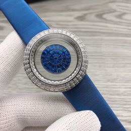 Classique nouvelles femmes argent plein de diamants glacés montres en acier inoxydable zircon Quartz montre dame géométrique bleu gemme cadran 38mm