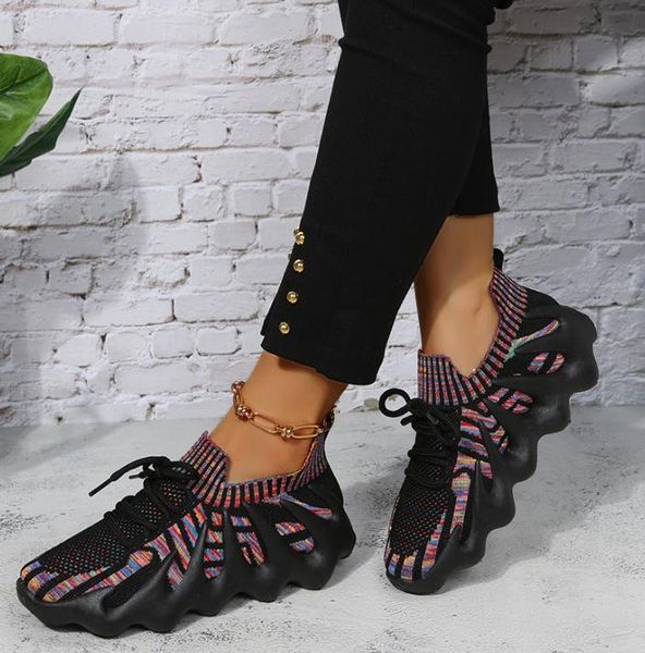 Zapatos clásicos de Octopus para mujeres nuevos zapatillas para mujeres ultra ligeras delgadas flying transpirable zapatillas casuales al por mayor