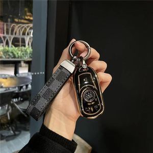 Llavero de cuero estampado clásico para coche, motocicleta, vehículo eléctrico, hogar, doble uso, llaves de cuero antipérdida, colgantes, accesorios para equipaje