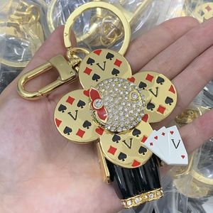 Klassieke hangsleutellang Keychains Fashion Alloy Key Chains Designer Poker Gedrukte Cartoon Dolls Key Chains Damesheren Unisex Lederen Key Rings Widget Ornament