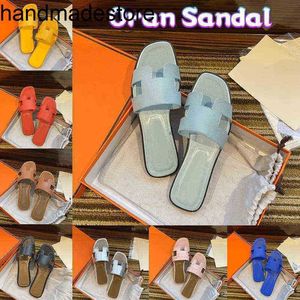 Klassieke pantoffel Orans sandaal Designer originele luxe platte dames echt leer zomerslippers sneaker strandglijbaan feest met logo