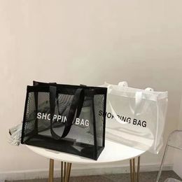 Bolsas de almacenamiento clásicas bolsa de compras de malla, patrón lujoso, bolsa de lavado de viaje, bolso transparente, bandolera de gran capacidad, de moda y popular