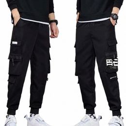 Classique Streetwear Casual Hommes Ribbs Harem Pantalon de jogging Homme Slim Fit Printemps Cargo Pantalon Multi-poches Femmes Pantalon S0bM #