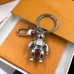 Llaveros de acero de titanio de moda de estilo clásico Llaveros de diseñador de astronauta robot de alta calidad con caja
