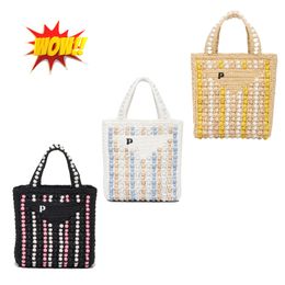 Klassische dreieckige Raffia-Strandtasche, schlichte Prad-Damen-Herrenhandtasche, Strohweiße Clutch-Tasche, luxuriöse Streifen-Designer-Webung, offene Umhängetasche, gelbe große Umhängetaschen