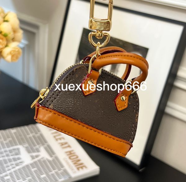 Classic Unisexe Key Pursets Pursets de luxe Mini Sacs de coquille de luxe avec sacs porte-clés Posses concepteurs Brands et hommes Sacs d'embrayage Sacs de pavage charmes Cadeau de pendentif cadeau