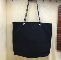 Imprimé blanc classique chaîne en toile noire sac à provisions sac de voyage de plage classique sac à linge femme cosmétiques organisateur de maquillage