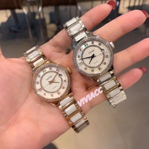 Classique Femmes Cristal Blanc Céramique Montre 32mm Or Rose Diamant Lunette Rome Montre Dames Géométrique Cercle Quartz Calendrier Montre-Bracelet