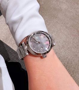 Classique femmes en acier inoxydable montre-bracelet à Quartz gris foncé nacre Zircon montre coquille cadran numéro nouveau calendrier montres horloge géométrique 34mm
