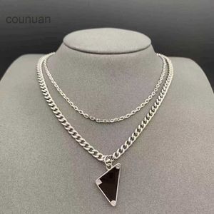 CLASSICS Collier deigner Femmes Hommes Chaînes Bijoux noir blanc P triangle Pendant Party Hip Hop Noms punk Déclaration Gold Mens Colliers