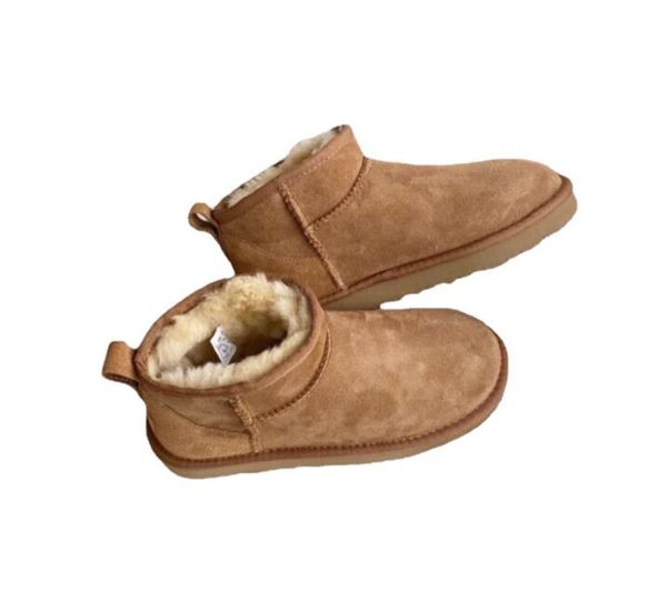 Classics câlin Ultra Mini bottes de neige en peau de mouton fourrure en peluche garder au chaud bottes carte sac à poussière tapis doux et confortable bottes décontractées chaussures beau cadeau