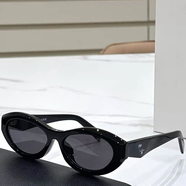 Clásicos Gafas de sol ovaladas de diseño Lentes de nailon HD UV400 Playa de moda callejera antiradiación para todos los estilos de uso a juego Gafas de sol de lujo unisex con caja