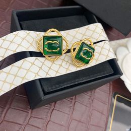 Estilo de clásicos 18k Gold de oro Pendientes de moda de la marca Diseñador de la marca Joya encanto bucle Drop amantes Sellos de regalos Pendientes de latón Familia y amigos A174